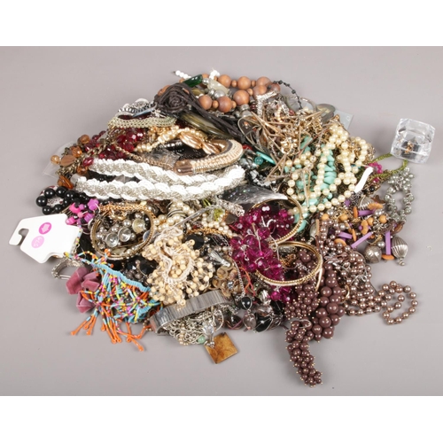 7 - A collection of costume jewellery. Beads, bangles etc