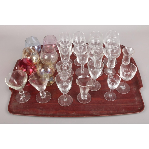 9 - A tray of assorted glassware. To include six coloured small brandy glasses, sherry and port etc (27)... 