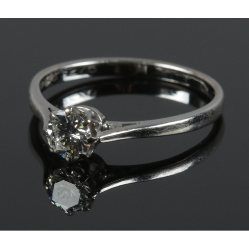 An 18ct white gold diamond solitaire ring. Size O. 2.41g.