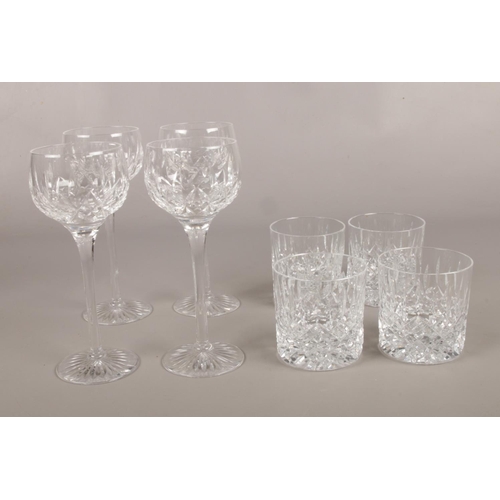 25 - A collection of Stuart cut crystal glass wares. Four tumblers, four hock wine glasses.
