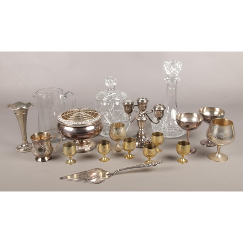36 - A collection of glass and metalwares. Includes silver plate, Bentley's Sparkling Beers jug, goblets,... 