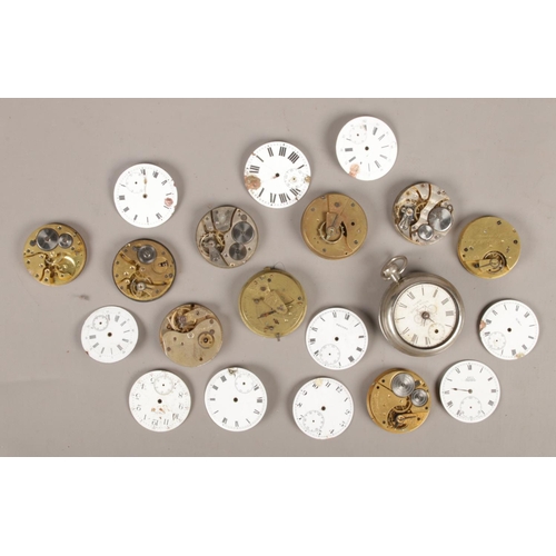 59 - An assortment of pocket watch movements. Includes Ingersoll Yankee Bicycle Watch.