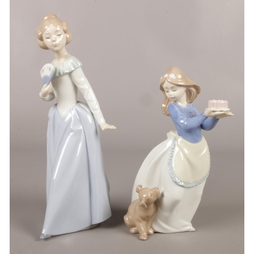 23 - Two Nao Spanish porcelain young lady figures. Tallest: 23.5cm.