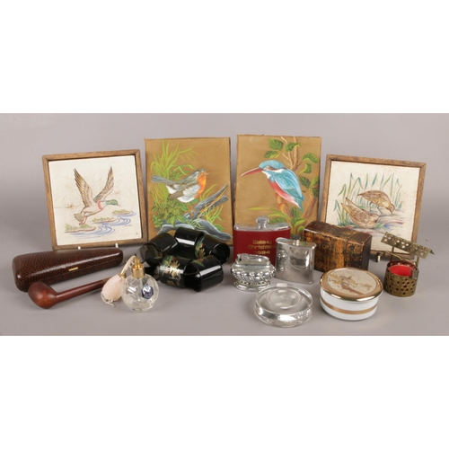 20 - An assortment of collectable items. To include two framed ceramic tiles, two hand painted silk plaqu... 