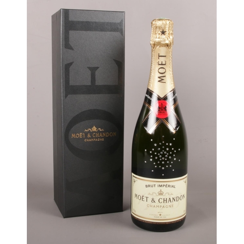 25 - A Moet & Chandon Champagne crystallized with Swaroski. (boxed)