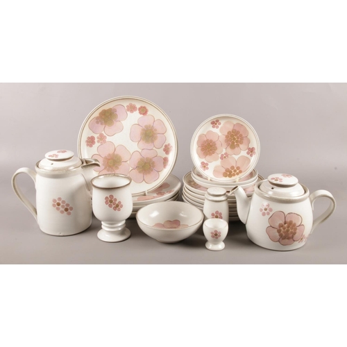60 - A large collection of Denby Gypsy dinnerwares. To include dinner plates of different sizes, coffee p... 