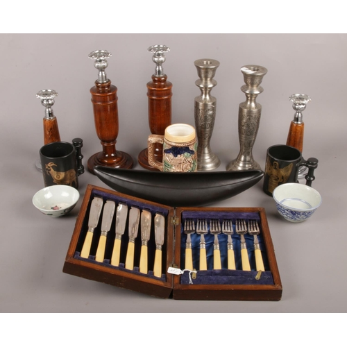 21 - A quantity of miscellaneous. Including wooden and silver plate candlesticks, oriental ceramic tea bo... 