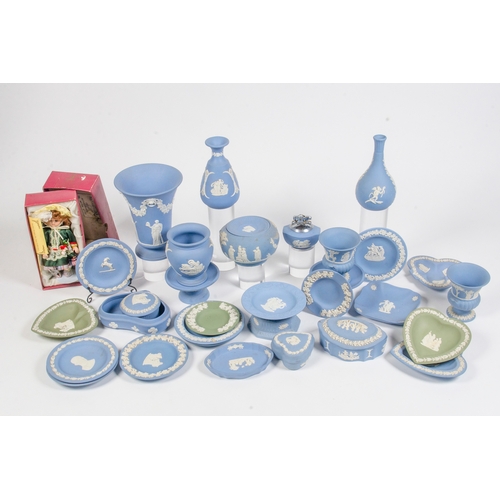 301 - Large quantity of blue slip relief Wedgwood, along with a Millicent doll.