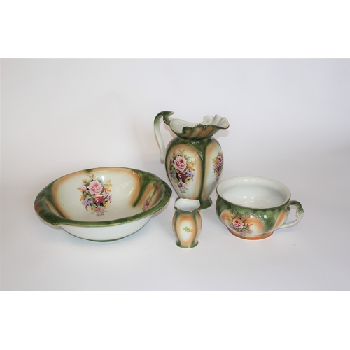 312 - A toilet jug set, green coloured, consisting of a jug, chamber pot and tooth brush holder.
