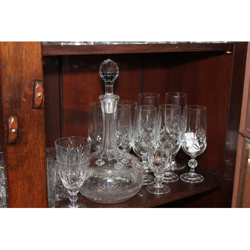 295 - A Large Quantity of cut glass, consisting of flutes, glasses, etc.