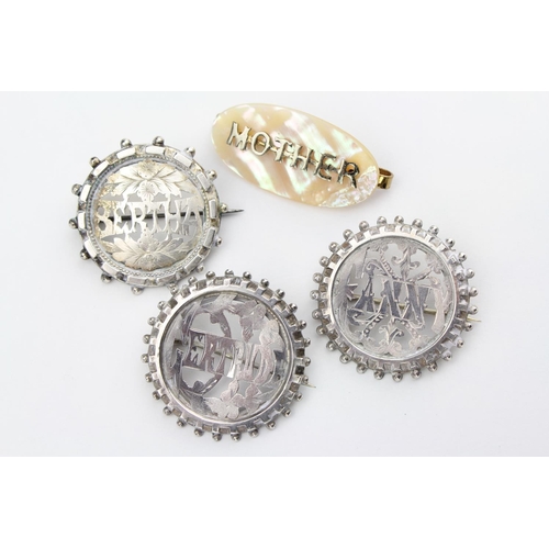 131 - Three Victorian silver engraved circular name brooches, Berthia, Gertrude, Fanny and Mother of Pearl... 