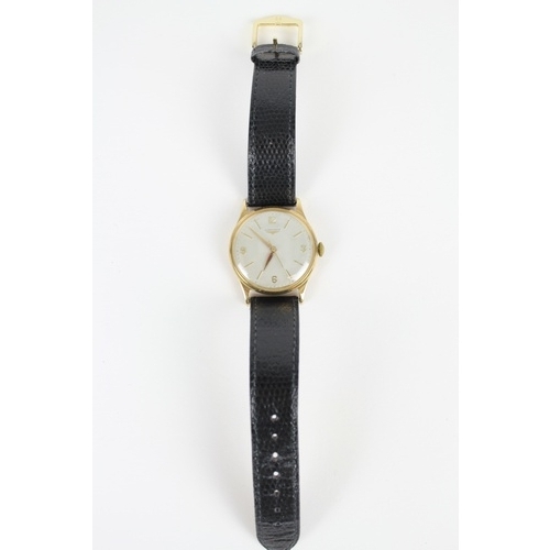 79 - A Gents Gold Longines Wrist Watch on Leather Strap.
