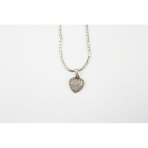37 - A Heart shaped Diamond pendant on chain.