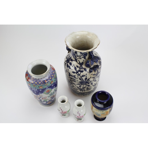 396 - A Chinese Multi Coloured Floral decorated vase along with 4 other vases.