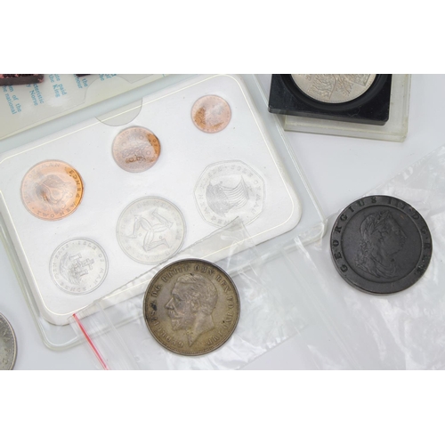 488 - A collection of coins to include a 1935 Silver Crown 