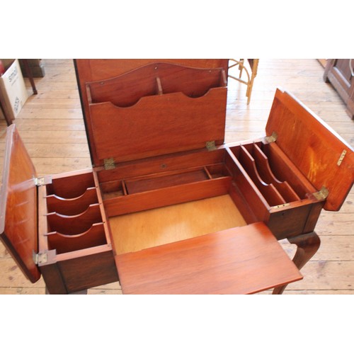 356 - A Mahogany Table Desk with three opening tops. Measuring: 92cms across x 46cms deep x 76cms high, an... 
