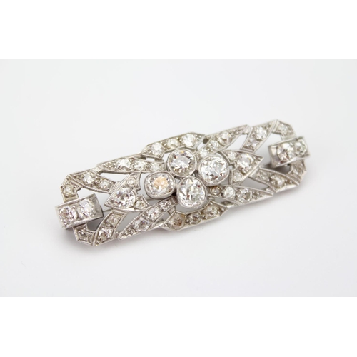 66 - A Beautiful 1930's Diamond and Platinum Set Brooch Set with Four Diamonds in a Collar Setting with F... 