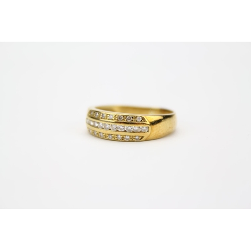 91 - A Ladies Gold Diamond Set Dress Ring, Mounted with Bands of Small Diamonds. Weighing 3.8 Grams.