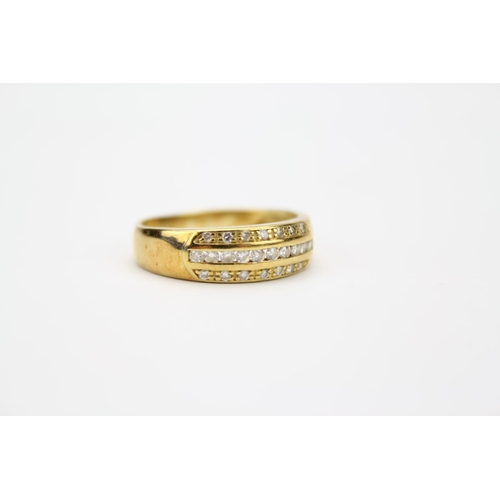 91 - A Ladies Gold Diamond Set Dress Ring, Mounted with Bands of Small Diamonds. Weighing 3.8 Grams.