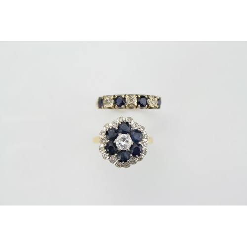 35 - A Ladies Sapphire and Diamond Cluster Ring mounted with a Single Diamond. Ring Size M. Total Weight ... 