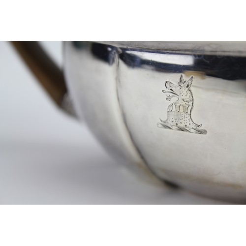 81 - A Peter & William Bateman Georgian Silver Oval Tea Pot with Crest . Weighing: 601g.