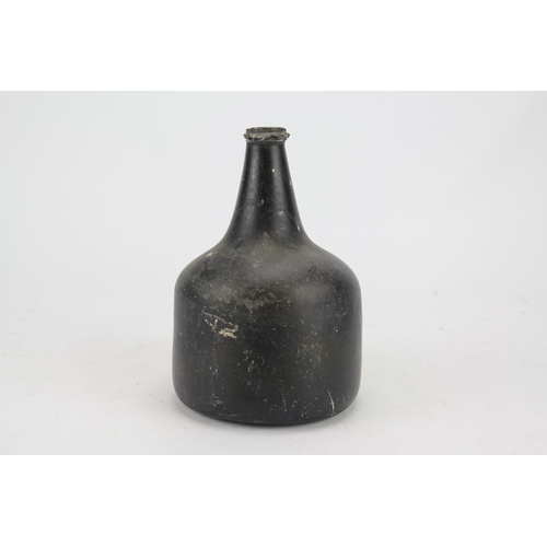 318 - An Antique Mallet shaped Green Glass Wine bottle with kicked in base and ribbed neck.