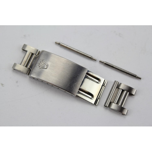 205 - An Original Stainless Steel Rolex Clasp along with Pins & a Spare Link.