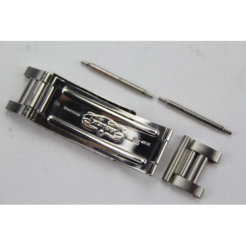 205 - An Original Stainless Steel Rolex Clasp along with Pins & a Spare Link.