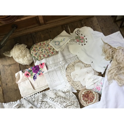 288 - A Linen Table Cloth, Chinese Fringed Shawl, Place Mats, etc.