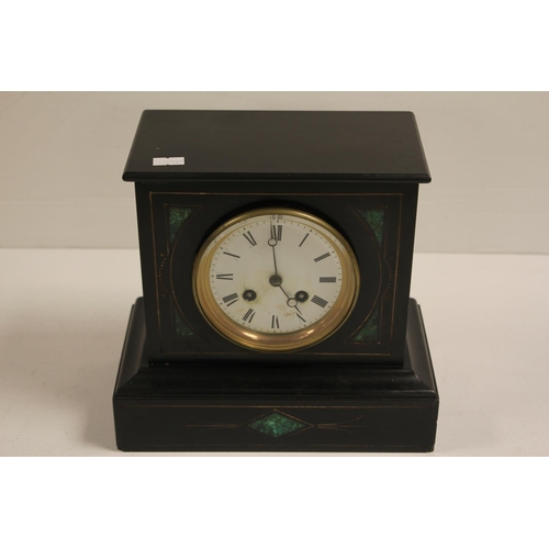 196 - A Late 19th Century Malachite & Slate Drawing Room Clock with enamelled Dial & Key.