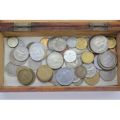 201 - A Collection of various Coins to include English, Swiss, etc contained in a wooden box.