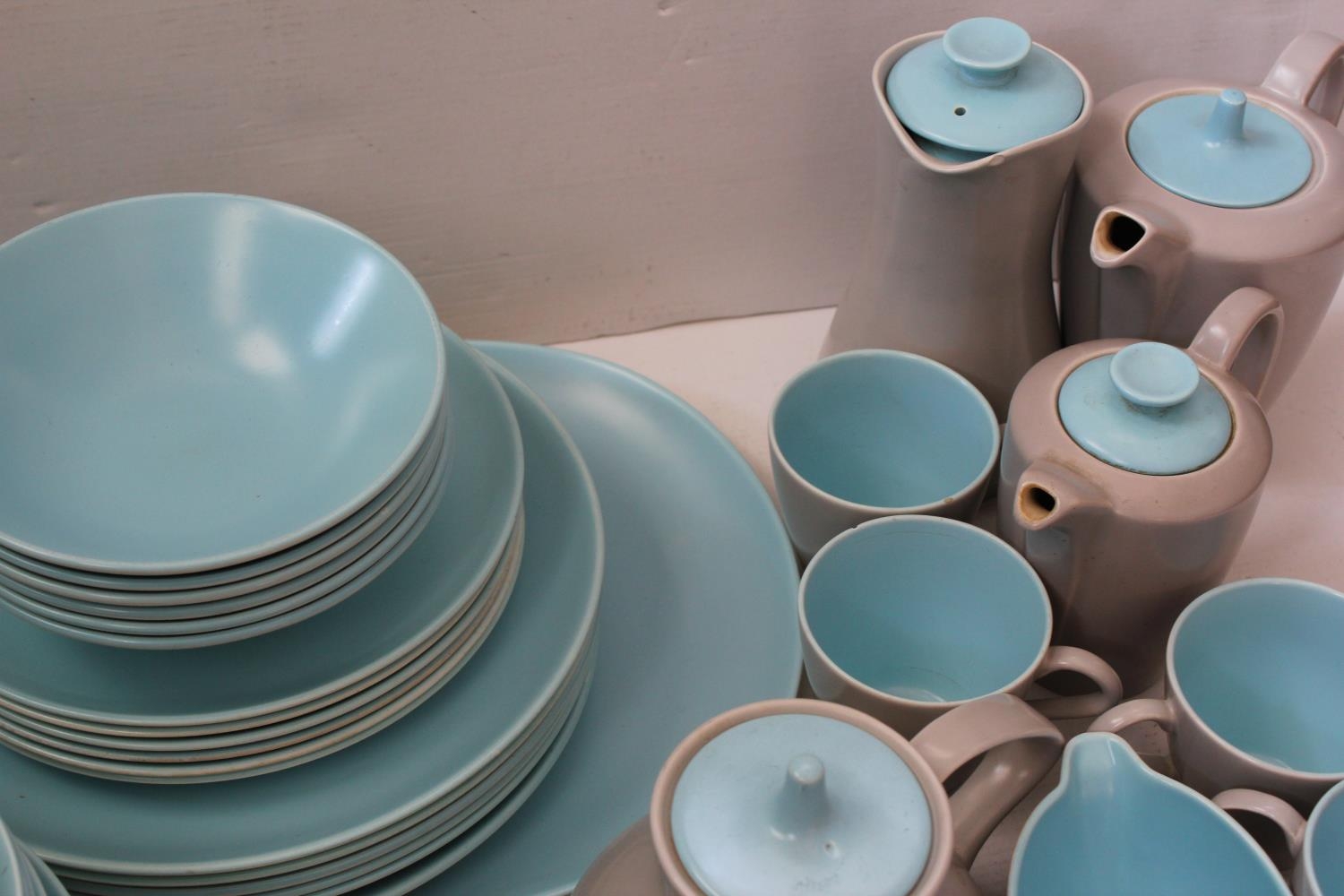 A Large Collection of Poole Pottery China in Light Blue & White to