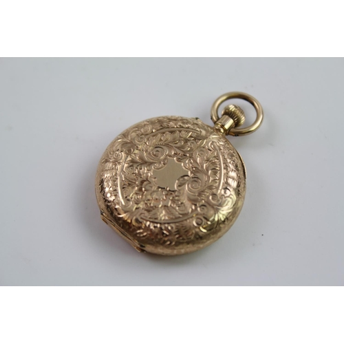 126 - A Ladies Swiss 14K marked pocket watch with engraved chapter ring.