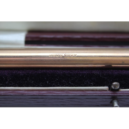 89 - A Scarce Onoto Plunger Action Fountain Pen, 9 Carat Body Bands, 14 Carat Nib, in Presentation Box.