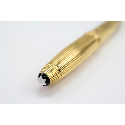 91 - A Montblanc Meisterstuck Solitaire Silver Gilt, 925 marked Fountain Pen. 18K gold two-tone fine nib.... 