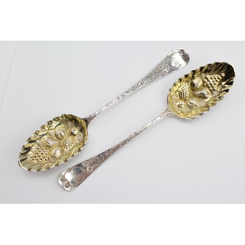 6 - A pair of Georgian Silver later decorated berry spoons, London B maker SH.