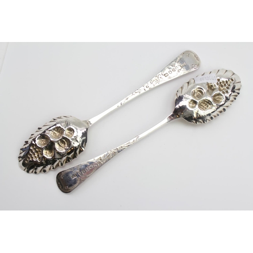 6 - A pair of Georgian Silver later decorated berry spoons, London B maker SH.