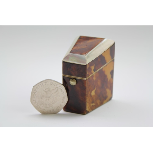 70 - A Georgian design tortoise mounted and mother of pearl thimble case with a fitted interior.