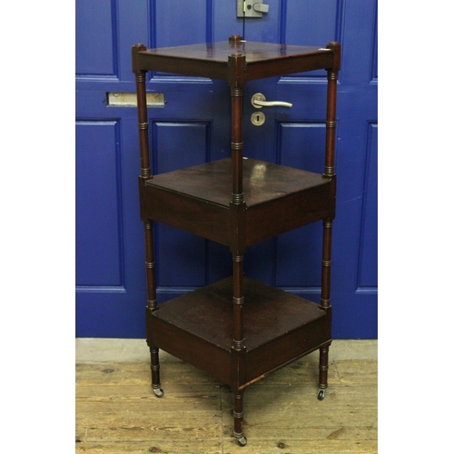 76 - A Victorian mahogany whatnot with turned side supports, fitted two drawers, on castors. Measuring: 1... 