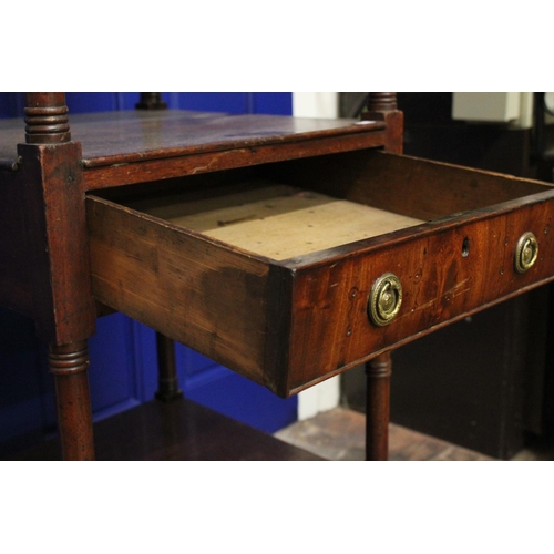 76 - A Victorian mahogany whatnot with turned side supports, fitted two drawers, on castors. Measuring: 1... 