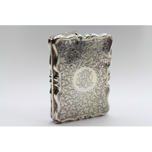 8 - A Victorian Silver engraved card case, with leather fitting, maker WA, Chester A.