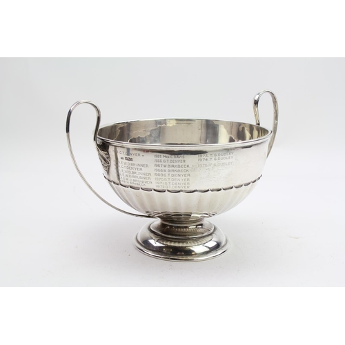 29 - A Silver large two handled trophy cup, with fluted decoration, the Donaldson Trophy for Roses, Sheff... 