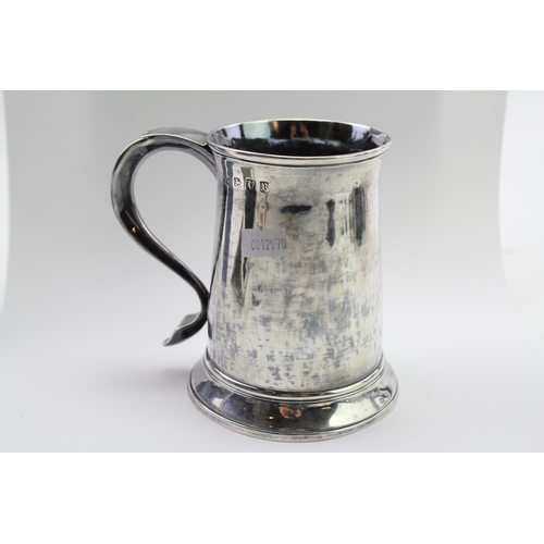 38 - A Georgian Silver Straight sided Tankard, Maker TW, London r, Owner DTE on flying scroll handle. Wei... 