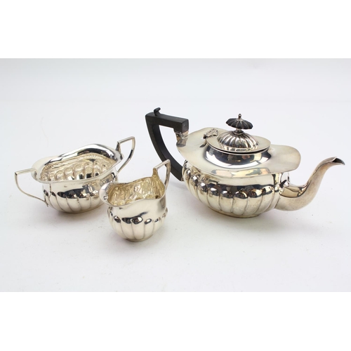 10 - A Three Piece Silver Bachelors Tea Set with Fluted design. Birmingham E. Weighing: 436 grams (Gross)... 