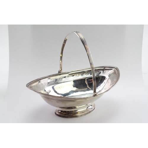 31 - A Georgian Bright Cut Engraved Silver basket in the 
