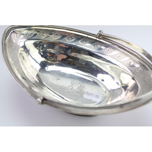 31 - A Georgian Bright Cut Engraved Silver basket in the 