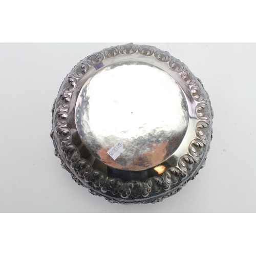 45 - A Silver coloured white metal Indian bowl. 
Weight approximately 864.6g. Size approximately 22x12