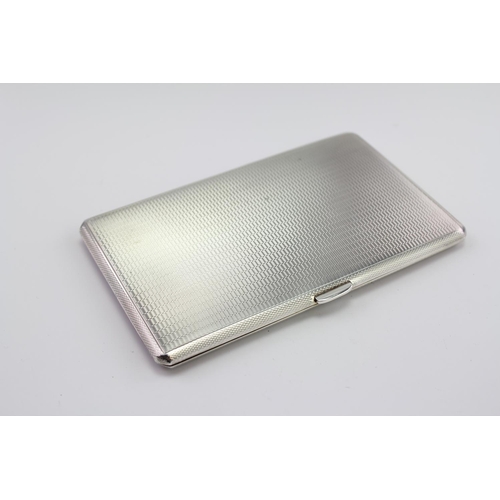 40 - A Gentleman's Engine Turned Silver Cigarette Case. Weighing: 201 grams.