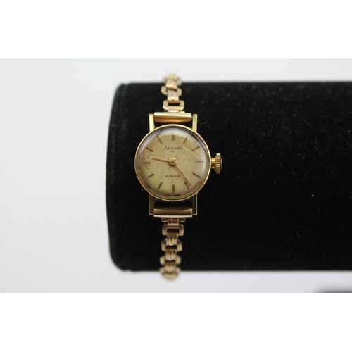 126 - A Ladies 18ct casing Gold Nevada cocktail Wristwatch with a rolled Gold strap.