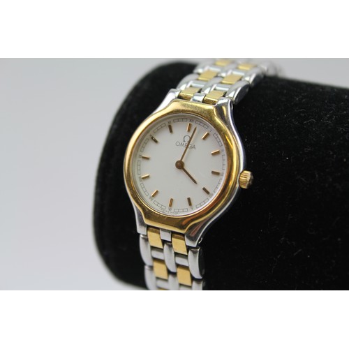 128 - A ladies Omega bi-metal wrist watch, with extendable clasp and white face.